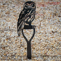 Boobook (Mopoke) Owl on Spade Handle